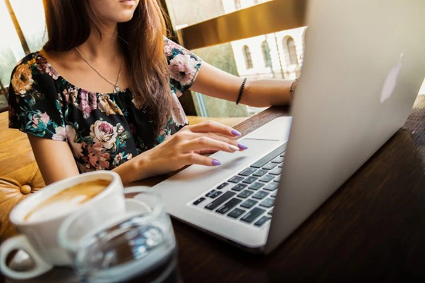 Working in a cafe.